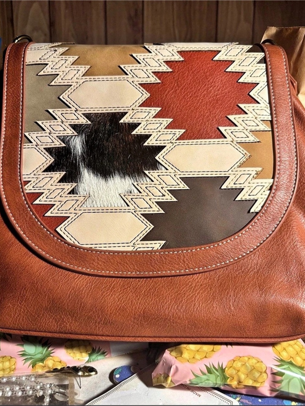 Catchfly Studio Shoulder Bag concealed carry pocket builtin the back.